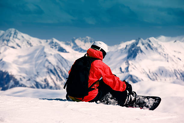 Snowboarder Resting stock photo