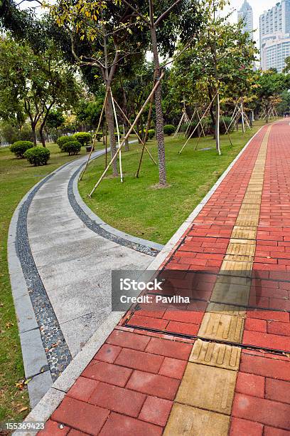 Pedestrian Walkways In Guangzhou Park Stock Photo - Download Image Now - Asia, Brick, Bush