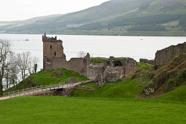 istock Urquhart castle with Loch ness in the background 155369575