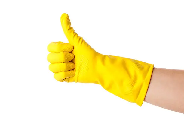 Thumbs up with a orange vinyl glove 