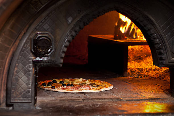 istock Pizza quattro stagioni (Four Seasons) in wood oven 155369807