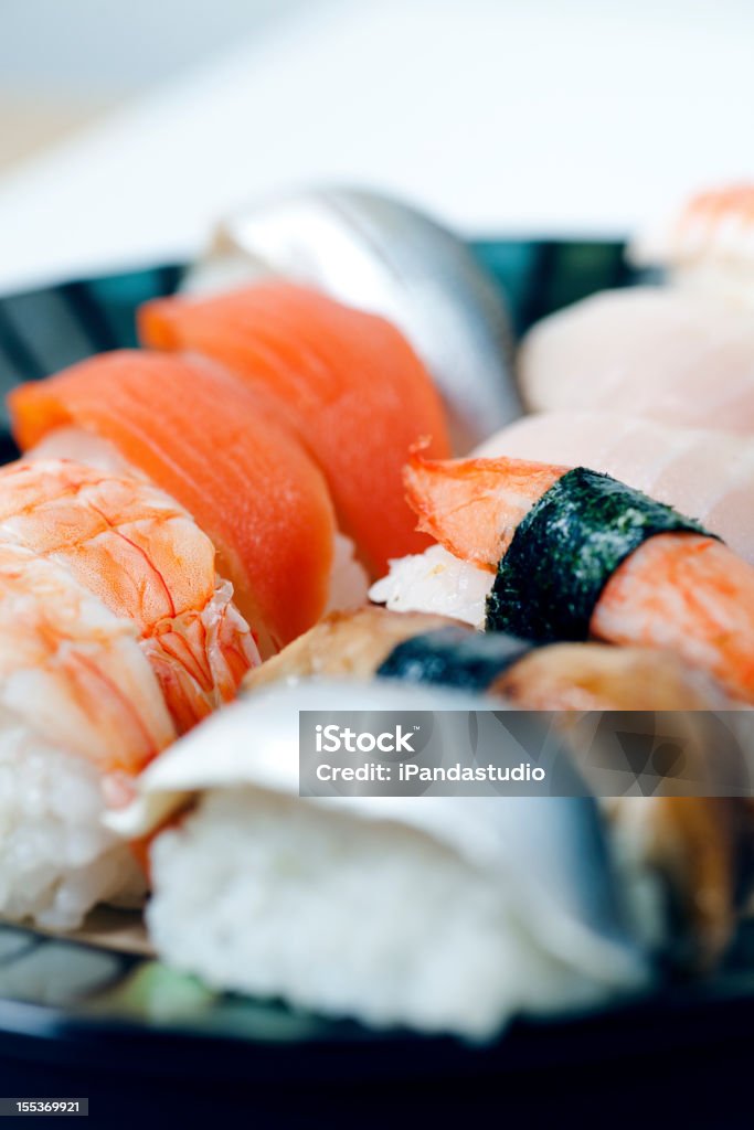 Diverse varietà di Sushi Sashimi e - Foto stock royalty-free di Alimentazione sana