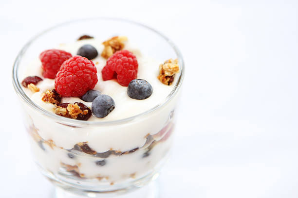 Close-up photo of breakfast berry yogurt parfait w/ granola breakfast  with yogurt parfait stock pictures, royalty-free photos & images