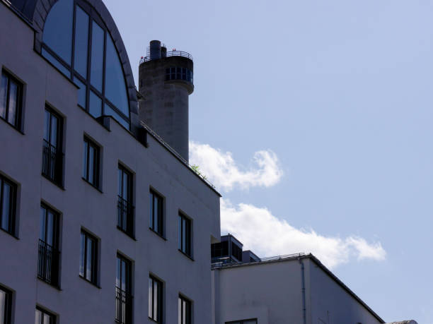 istock Low angle view of buildings against sky 1553701467