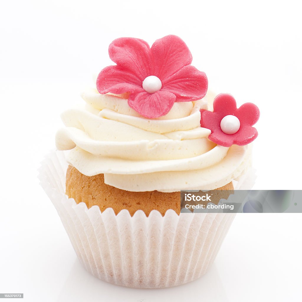 Vanille Cupcakes mit roten Zucker Blumen - Lizenzfrei Cupcake Stock-Foto