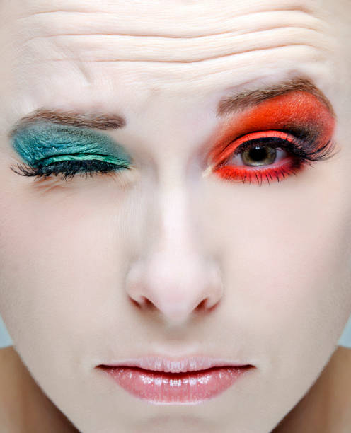 istock woman winking eye 155370333