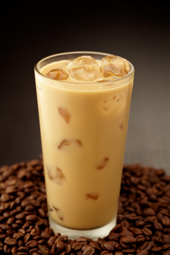 Iced coffee with milk.  Professionally color corrected, exported 16 bit depth, retouched and saved for maximum image quality.