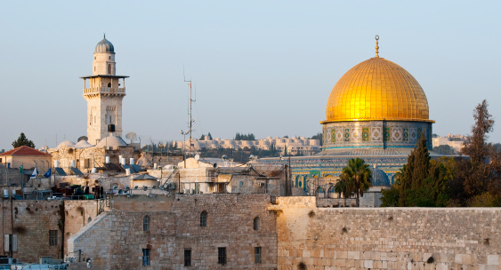 The Dome of the Rock, an Islamic shrine constructed in the late 7th century, in Jerusalem. In the foreground is the Western Wall, first contructed in the 1st century BC by Herod the Great.