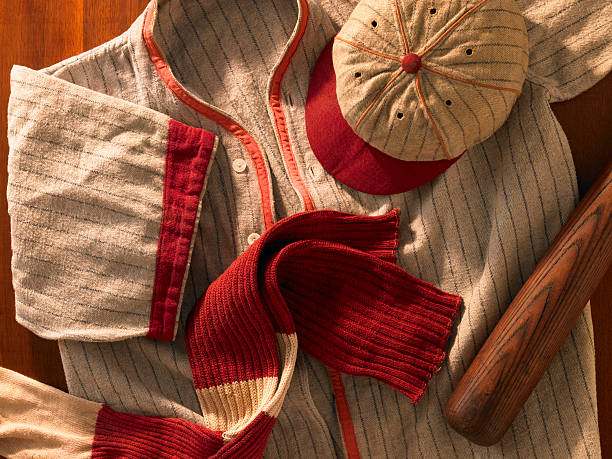 istock Old-time wool baseball uniform with cap, socks and bat 155370467