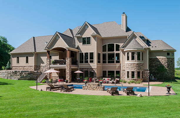 istock House with swimming pool with a clear blue sky 155370723
