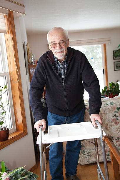 istock A senior man using a walker in a home 155370745