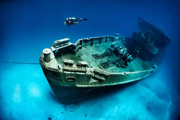 The ex-USS Kittiwake was a Submarine Rescue vessel (ASR-13). She was part of the 6th Submarine squadron (SUBRON 6) home ported at the Destroyer-Submarine piers in Norfolk, VA. The location for sinking the Kittiwake is at the northern end of Seven Mile Beach, on the West or lee side of Grand Cayman.