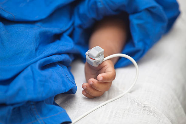 Monitoring a child stock photo