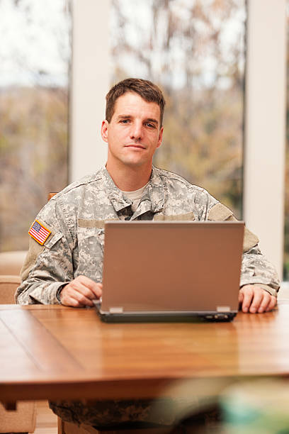 istock American soldier with laptop 155372291