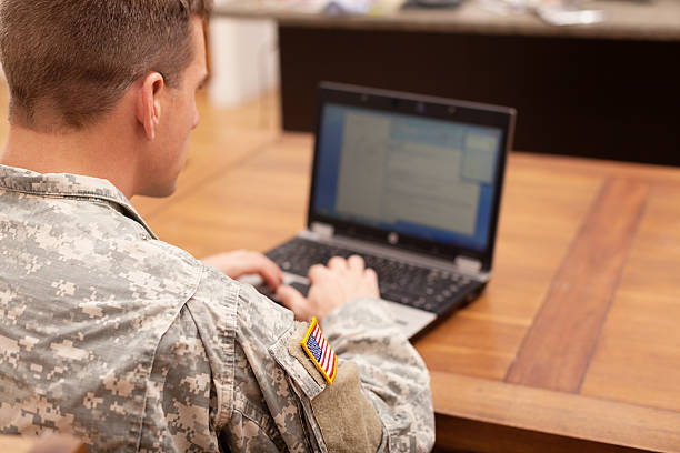 istock American soldier working on laptop 155372292