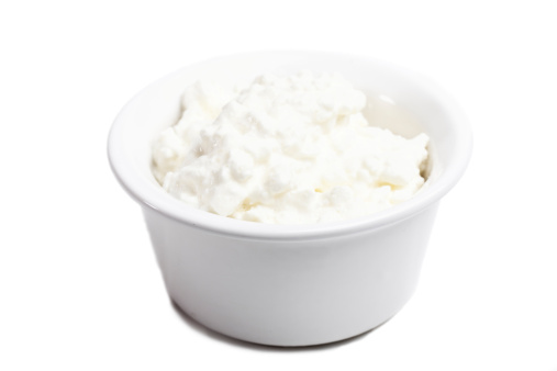 bowl of cottage cheese on white