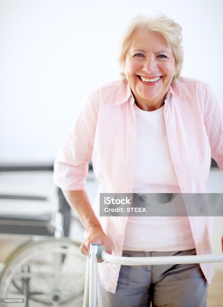 Pleased with her progress! Portrait of a delighted female patient getting to grips with her new walking-frame 60-69 Years Stock Photo