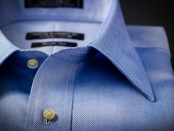 folded blue shirts in a stack