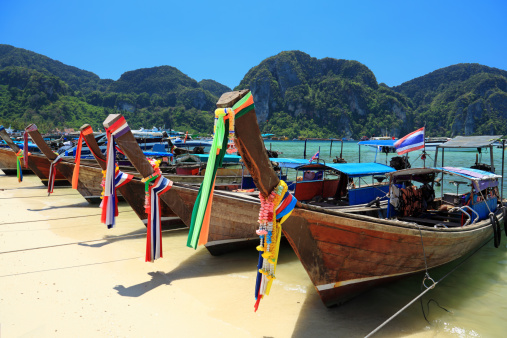 Long tail wooden boats at the beach-Phi Phi Islands-Thailand