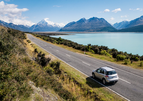 Motion blur on a car on a summer journey in the Mount Cook National Park on New Zealand's South Island.