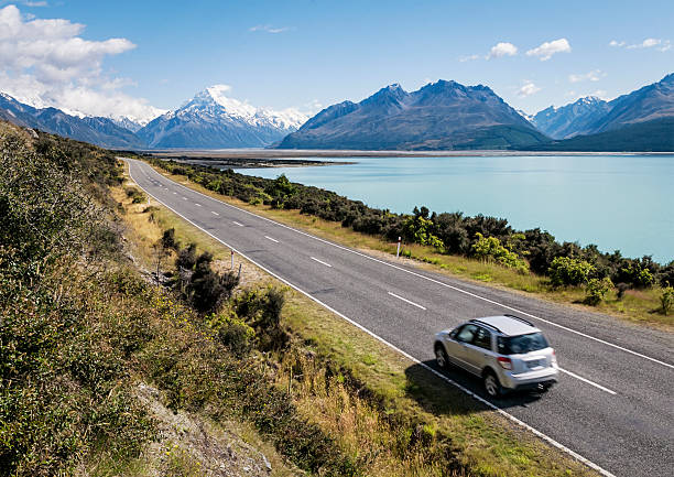 New Zealand Adventure Motion blur on a car on a summer journey in the Mount Cook National Park on New Zealand's South Island. steep photos stock pictures, royalty-free photos & images