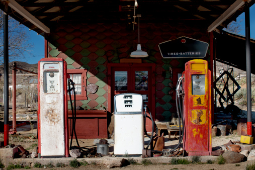 Old gas pumps, weathered and abandoned