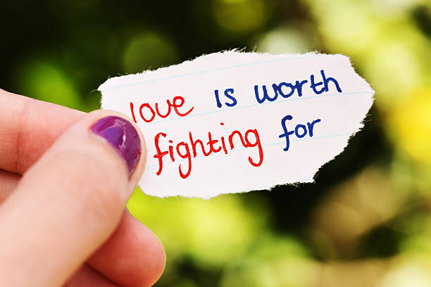 istock Love is worth fighting for says hand-drawn note 155373255