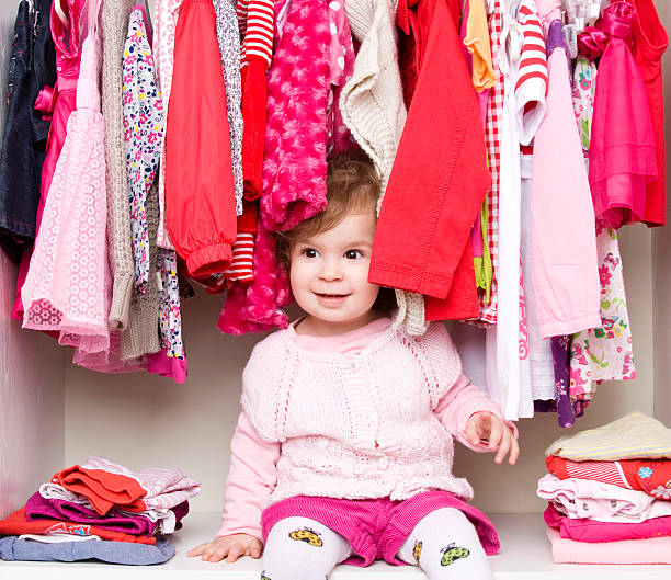 istock Baby girl choosing her clothes 155373259