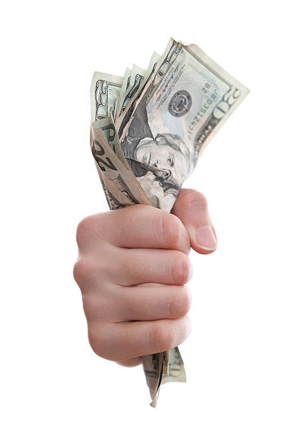 istock fist full of dollars 155373712