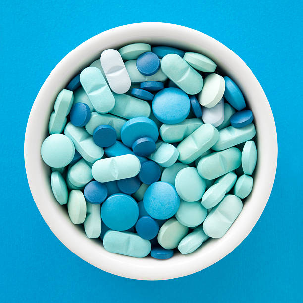 ブルーの薬 - pill medicine capsule excess ストックフォトと画像