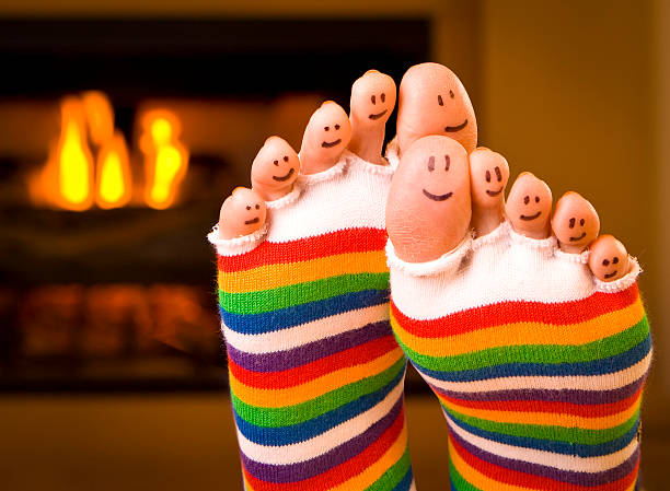 Warm Happy Feet Warm Happy Feet by fireplace toe stock pictures, royalty-free photos & images