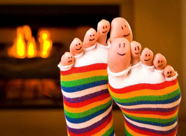 Warm Happy Feet by fireplace