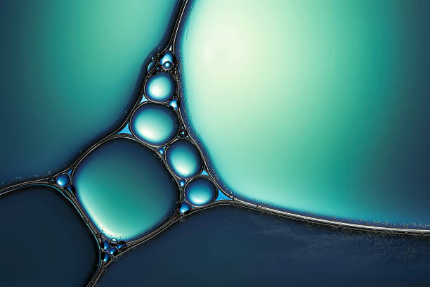 aceite & agua azul turquesa detalle de fondo abstracto - macrofotografía fotos fotografías e imágenes de stock