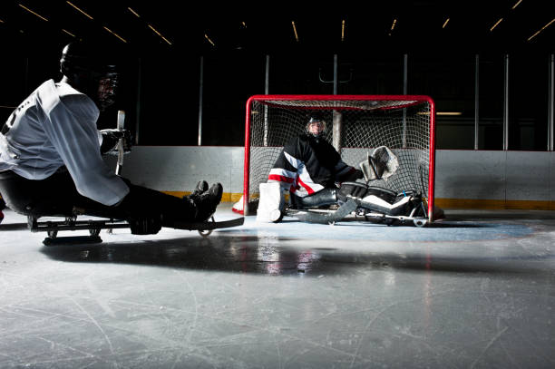 istock Two people in a hockey game on the ice rink 155375067