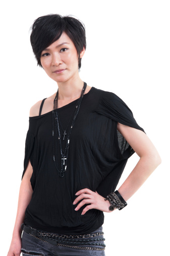 Cool girl with short hair isolated on plain background
