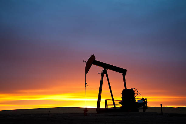 Pumpjack Silhouette  drumheller stock pictures, royalty-free photos & images