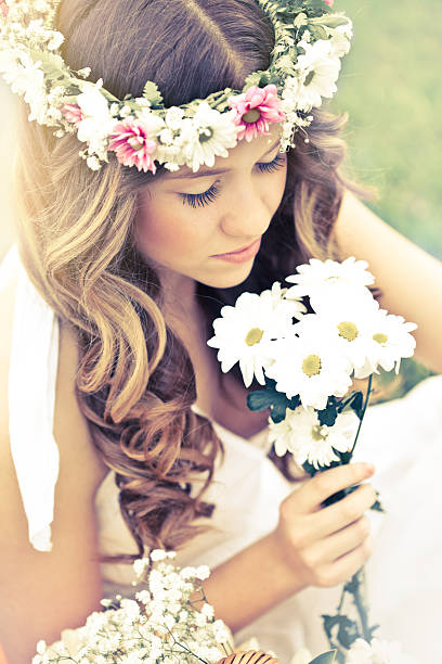 istock Hippie young woman with flowers 155375415