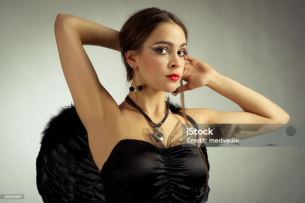 Ragazza angelo nero - Foto stock royalty-free di Donna seducente