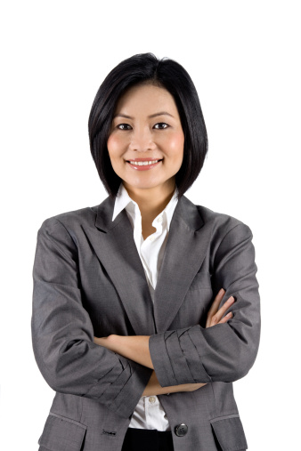 Modern Businessperson With Her Arms Folded. 