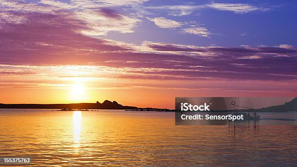 Fisher Boats Floating In A Bay Stock Photo - Download Image Now - Minorca, Back Lit, Balearic Islands