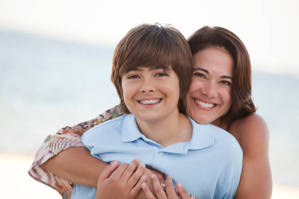 Mother &amp; Son on the Beach stock photo