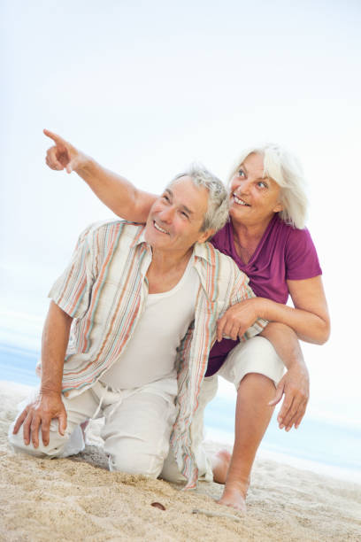 istock Happy Senior Couple on the Beach 155376014