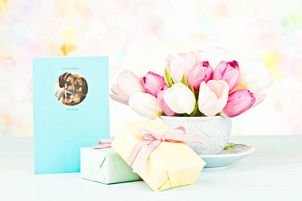 Happy Birthday Greeting Card with Pink Tulips Flowers on Wooden Background