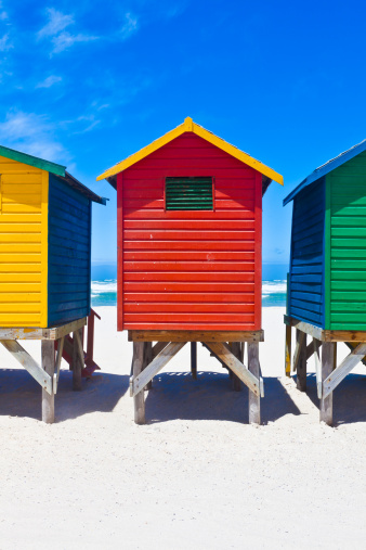 Brightly painted beach huts in Muizenberg Cape Town, South Africa