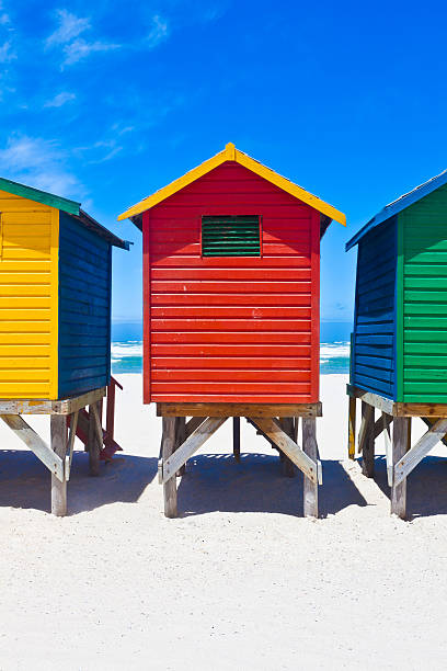 Beach Huts Brightly painted beach huts in Muizenberg Cape Town, South Africa beauty in nature vertical africa southern africa stock pictures, royalty-free photos & images