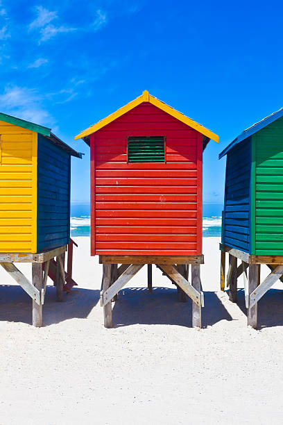 Beach Huts Brightly painted beach huts in Muizenberg Cape Town, South Africa pretty beach house stock pictures, royalty-free photos & images