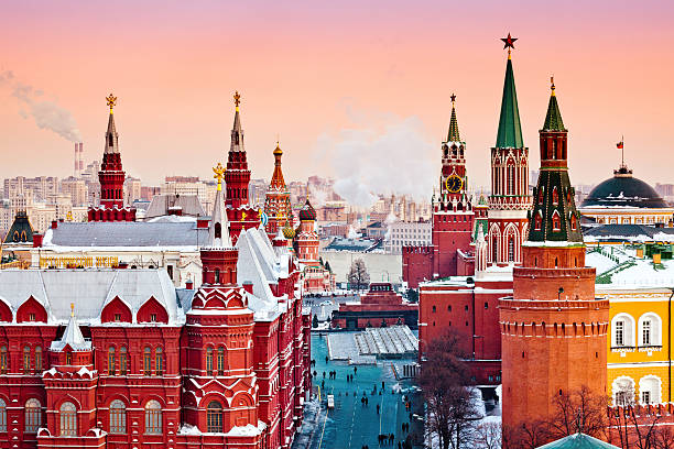 Red Moscow at winter sunset Historical Museum, St.Basil Cathedral, Red Square, Kremlin in Moscow. View from top of the Ritz-Carlton hotel. moscow stock pictures, royalty-free photos & images