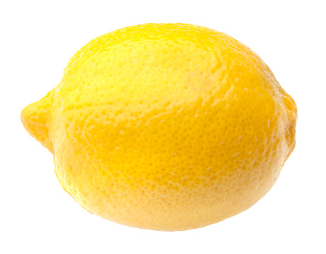 Whole lemons, slices and green leaves close-up on a white background. Isolated