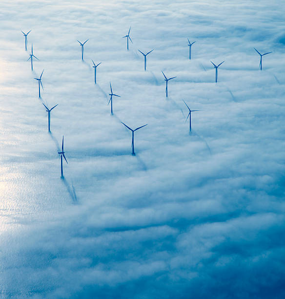 Flying over Copenhagen. The windmill park between Denmark & Sweden coming through the clouds - as the aircraft is getting ready to land. danish culture photos stock pictures, royalty-free photos & images