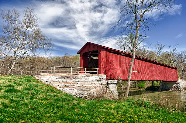 Covered Bridge An historic covered bridge in Indiana. indiana covered bridge stock pictures, royalty-free photos & images